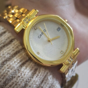 CASIO Ronde gold + Dateur